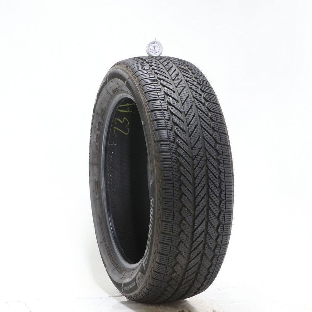 Set of (2) Used 235/55R20 Bridgestone WeatherPeak 102H - 6.5/32 - Image 1