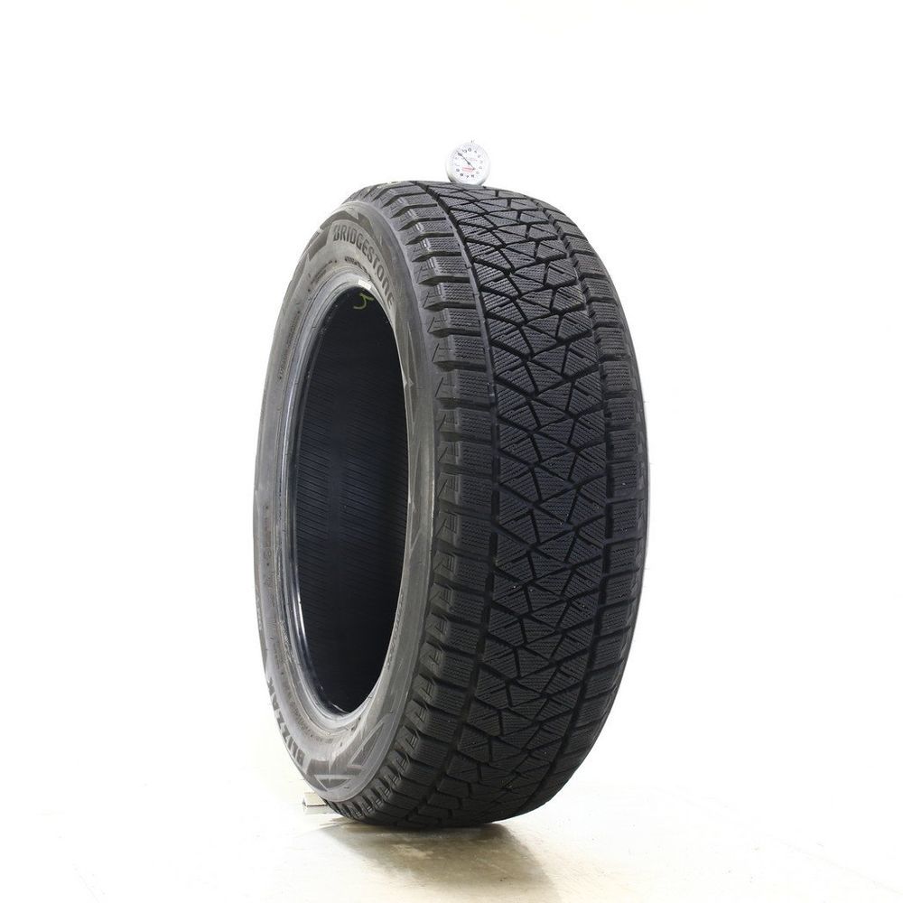 Set of (2) Used P 235/55R19 Bridgestone Blizzak DM-V2 105T - 12-13/32 - Image 1