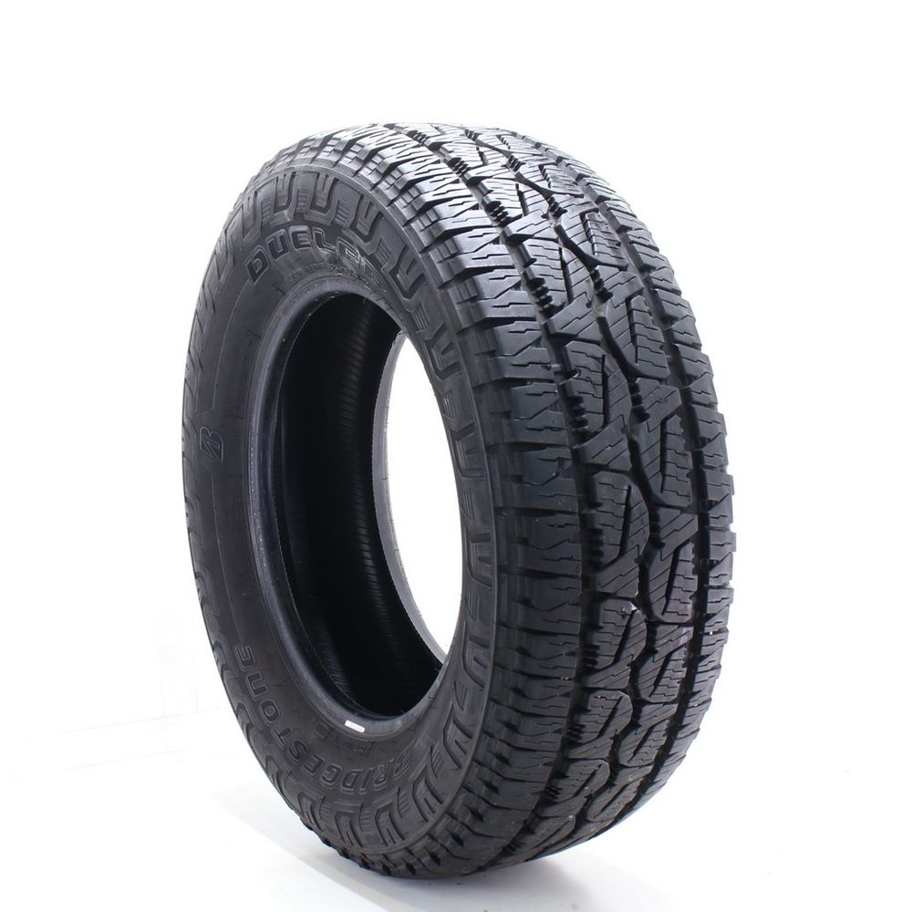 Set of (2) Used LT 275/65R18 Bridgestone Dueler A/T REVO 3 123/120S - 14-15/32 - Image 1
