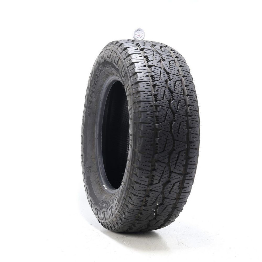 Used LT 275/65R18 Bridgestone Dueler A/T REVO 3 123/120S E - 13.5/32 - Image 1