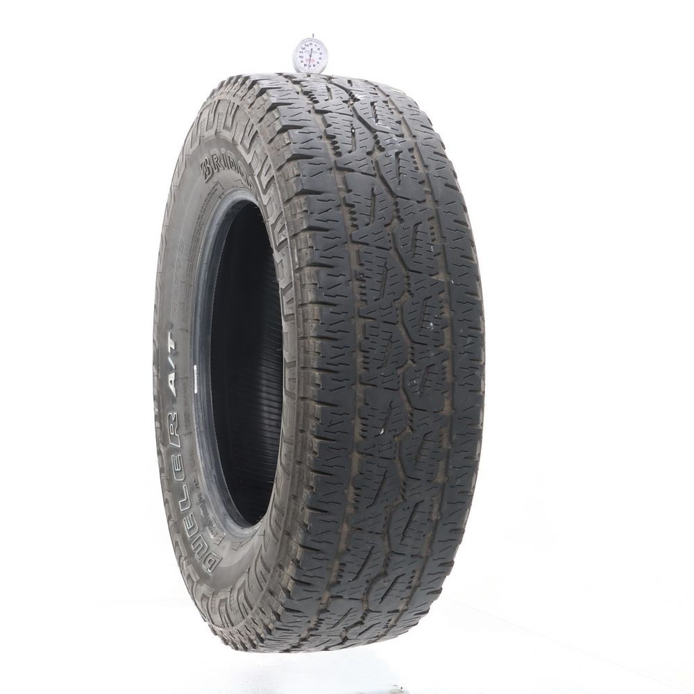 Used LT 265/70R18 Bridgestone Dueler A/T REVO 3 124/121R E - 7/32 - Image 1