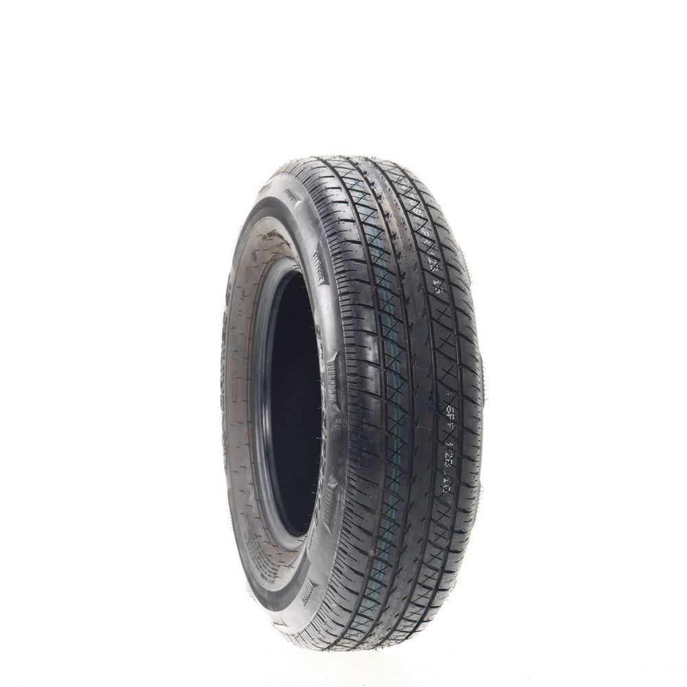 Set of (4) Driven Once ST 205/75R14 Rainier ST 100/96M C - 8/32 - Image 1