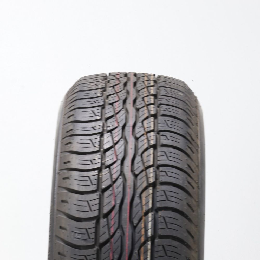 Set of (2) Driven Once 235/65R18 Bridgestone Dueler H/T 687 104T - 9.5/32 - Image 2