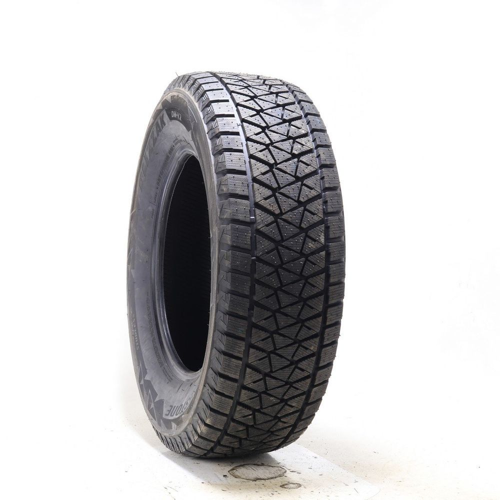 Set of (4) New 275/65R18 Bridgestone Blizzak DM-V2 114R - 13/32 - Image 1