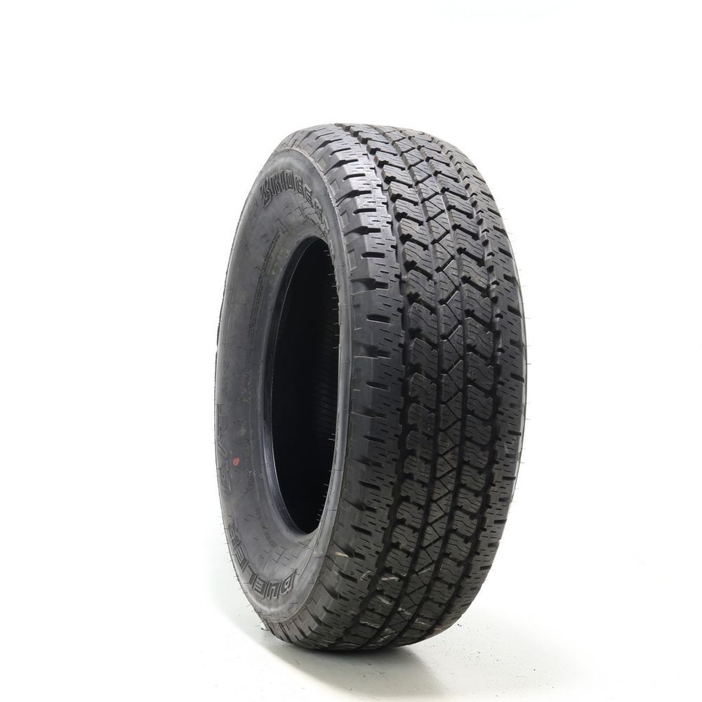 Set of (2) Driven Once 255/65R17 Bridgestone Dueler A/T RH-S 110T - 12.5/32 - Image 1