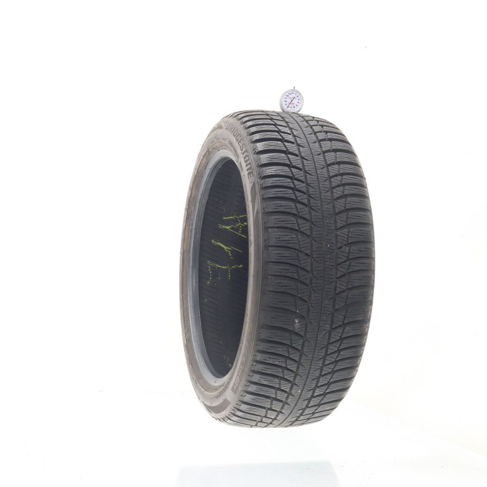 Set of (2) Used 235/45R18 Bridgestone Blizzak LM-001 98V - 8-9/32 - Image 1