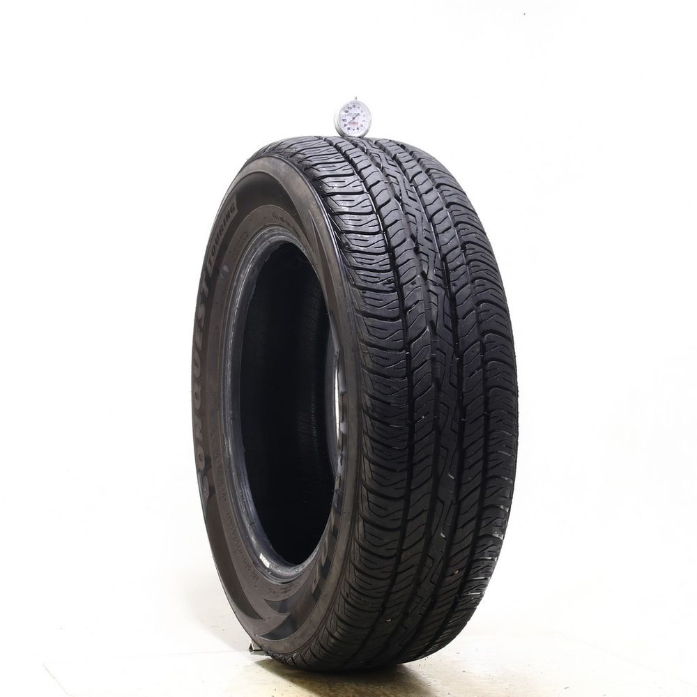 Used 225/65R17 Dunlop Conquest Touring 102T - 8.5/32 - Image 1