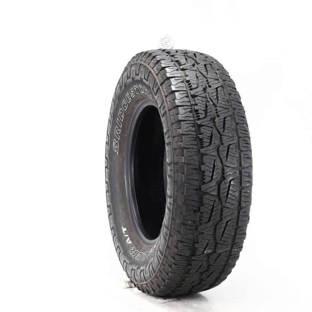 Set of (2) Used 265/70R17 Bridgestone Dueler A/T REVO 3 113T - 9.5-10/32 - Image 1