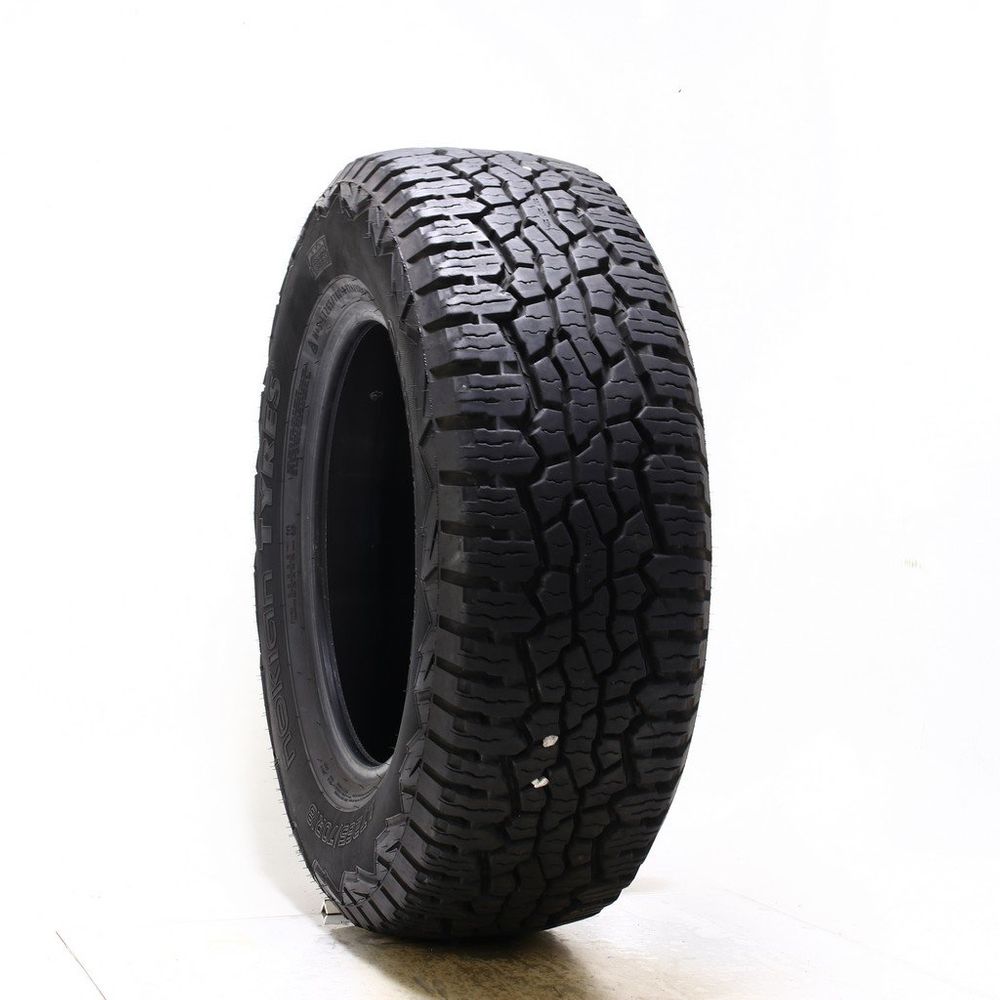 Used LT 265/70R18 Nokian Outpost AT 124/121S E - 16/32 - Image 1
