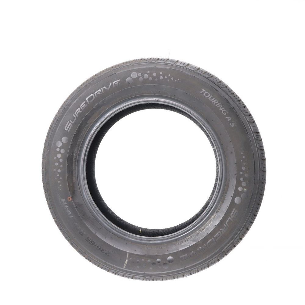 Set of (4) Used 235/65R17 SureDrive Touring A/S TA71 104H - 10-10.5/32 - Image 6