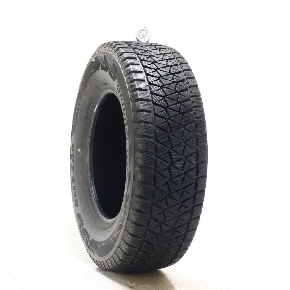Set of (2) Used 265/70R17 Bridgestone Blizzak DM-V2 115R - 11/32 - Image 1