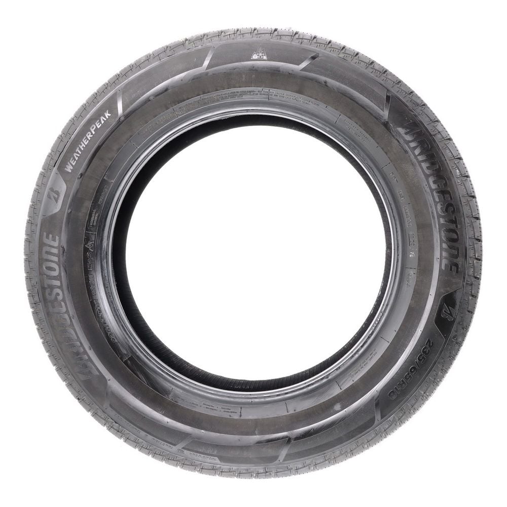 Set of (2) Used 235/65R18 Bridgestone WeatherPeak 106H - 8-8.5/32 - Image 6