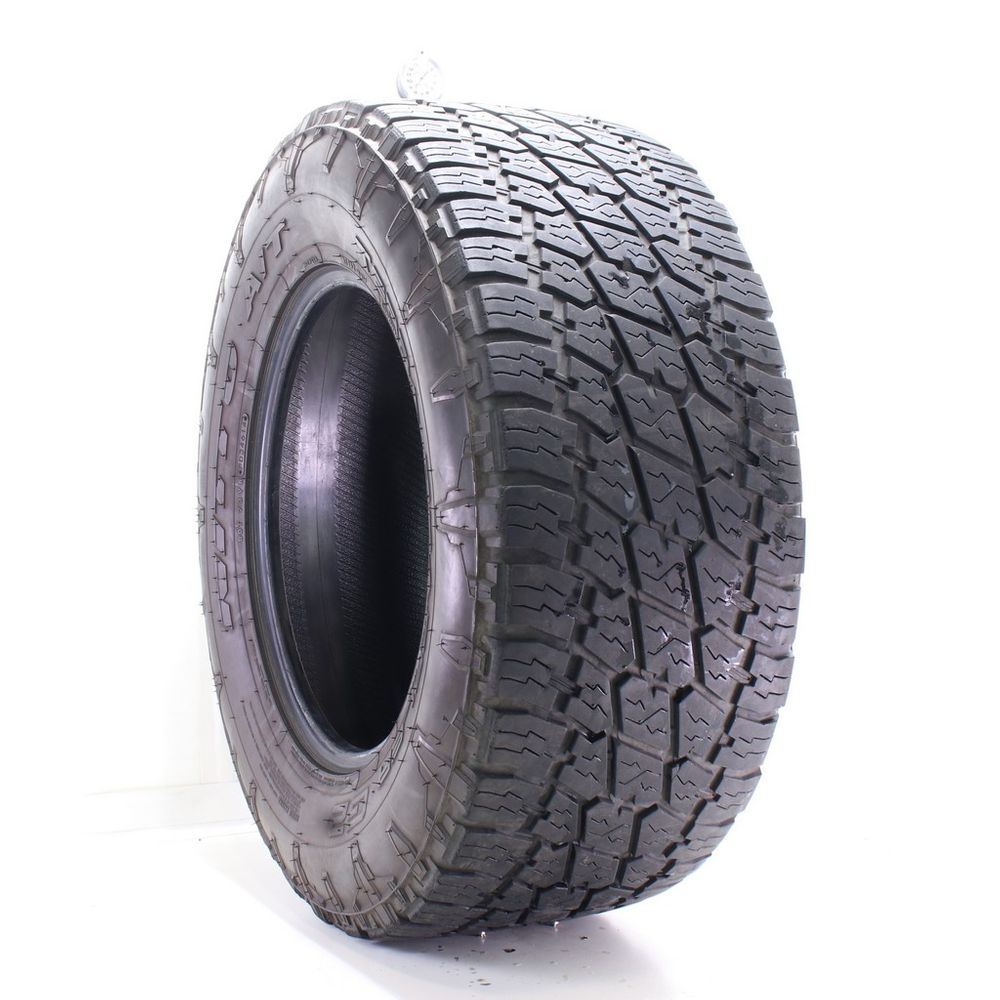 Used LT 325/60R18 Nitto Terra Grappler G2 A/T 124/121S E - 8.5/32 - Image 1