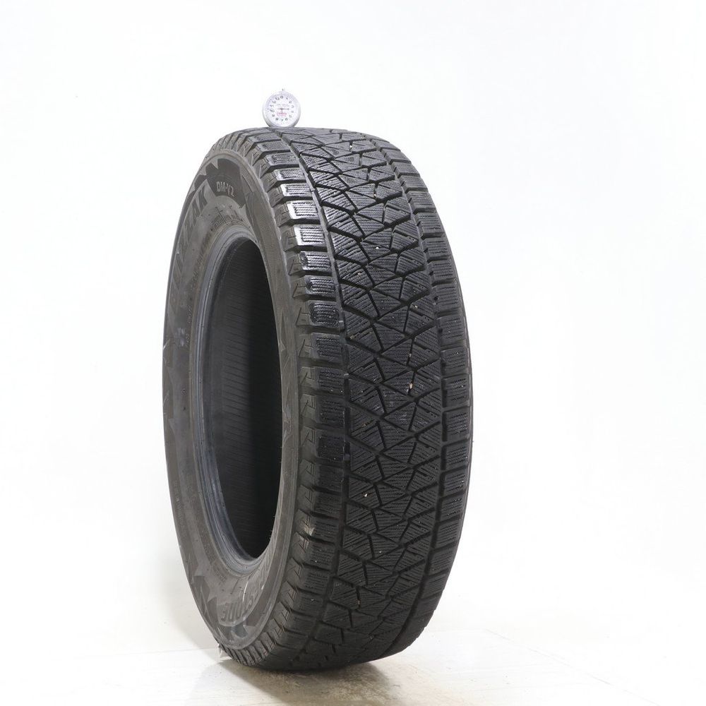 Used 235/65R17 Bridgestone Blizzak DM-V2 108S - 10.5/32 - Image 1