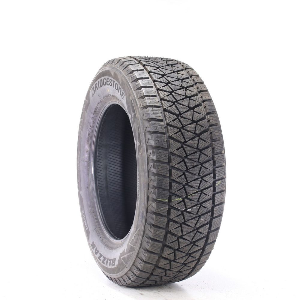 Set of (2) Driven Once 275/60R18 Bridgestone Blizzak DM-V2 113R - 14/32 - Image 1