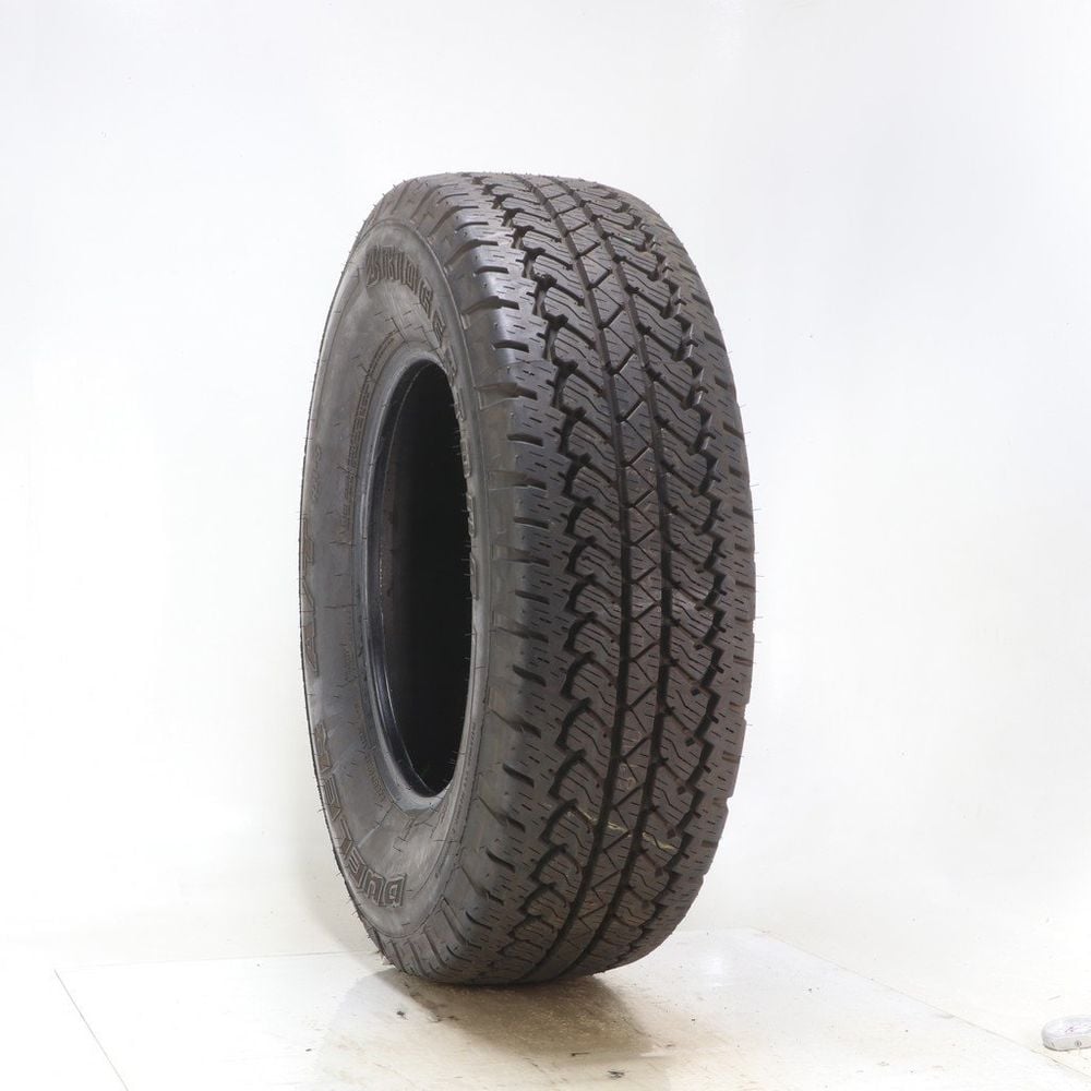 Set of (4) Driven Once 265/70R17 Bridgestone Dueler A/T RH-S 113S - 13/32 - Image 1