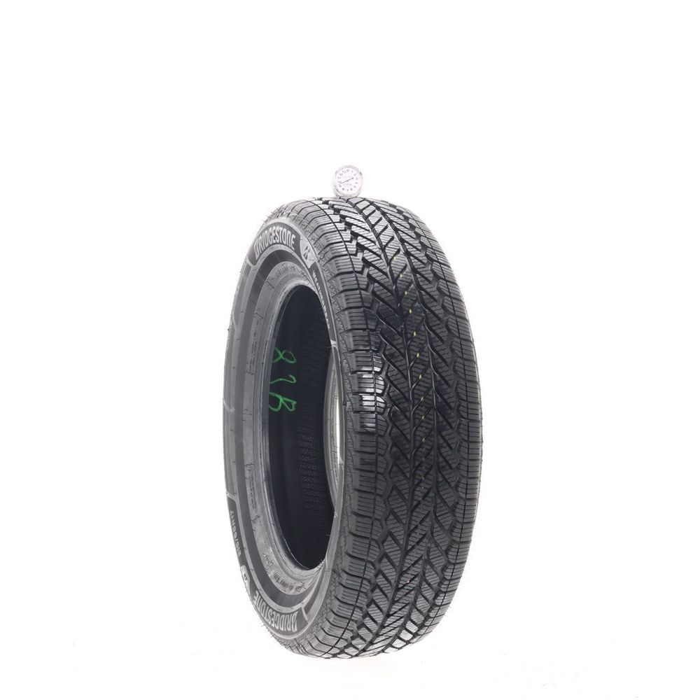 Used 215/65R17 Bridgestone WeatherPeak 99H - 9.5/32 - Image 1