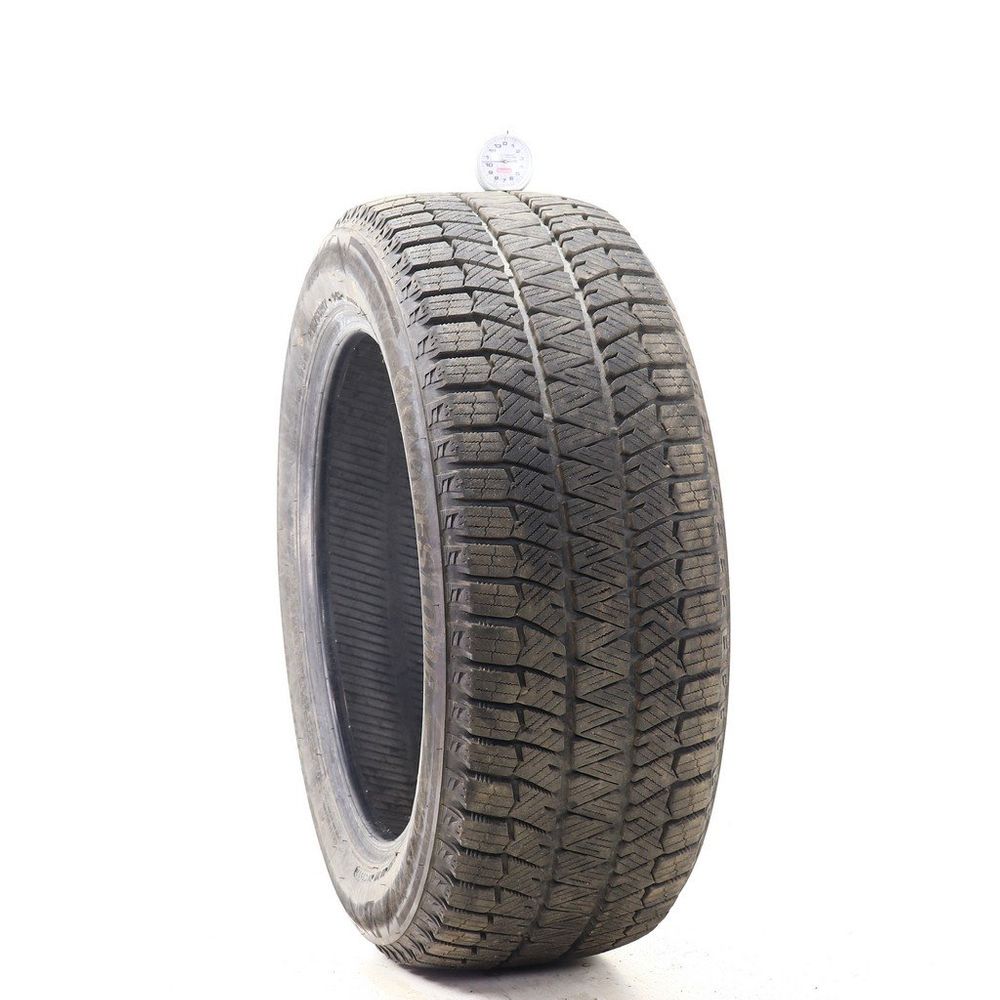 Set of (2) Used 215/55R17 Bridgestone Blizzak WS90 Studless 94H - 10-11/32 - Image 1