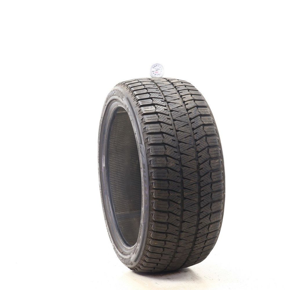 Set of (2) Used 245/40R18 Bridgestone Blizzak WS90 Studless 97H - 9.5-11/32 - Image 1