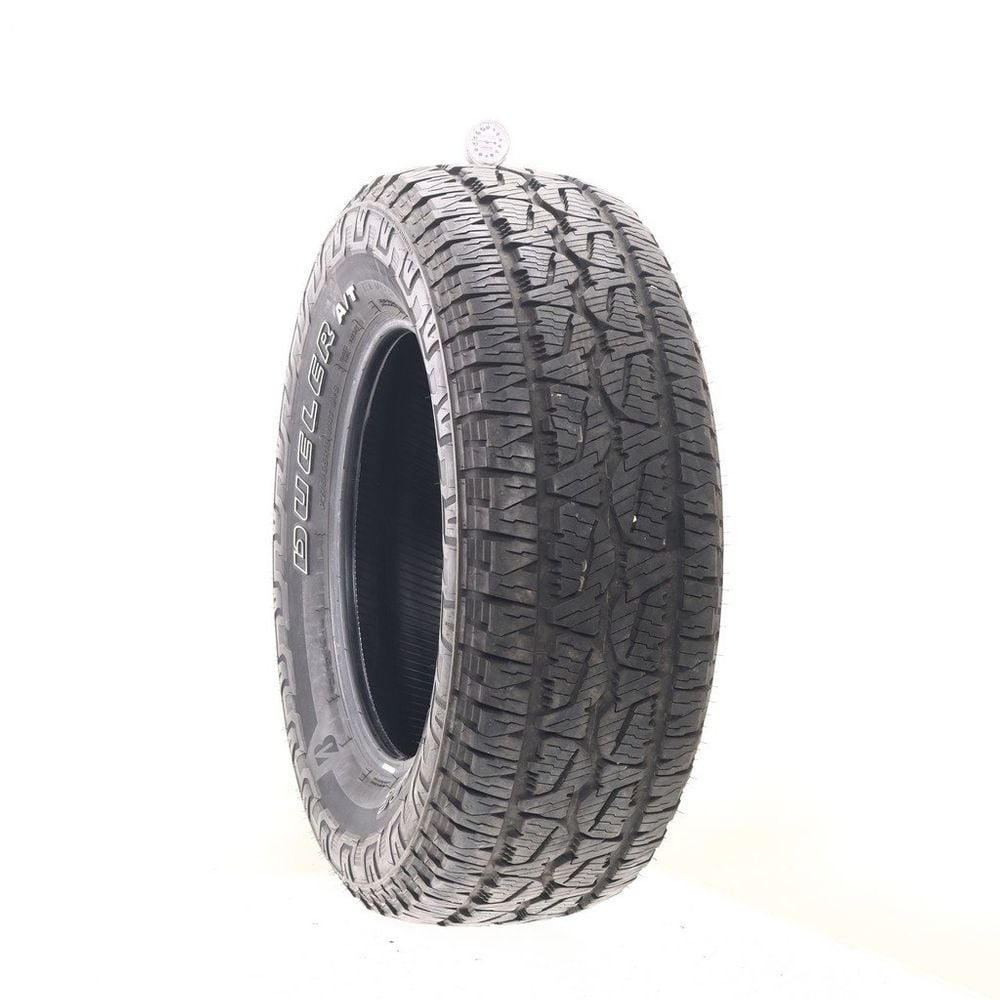 Set of (4) Used 275/65R18 Bridgestone Dueler A/T REVO 3 114T - 10.5-11.5/32 - Image 1