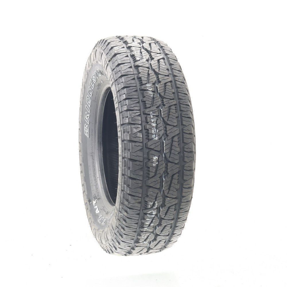 Set of (2) New 265/70R17 Bridgestone Dueler A/T REVO 3 113T - Image 1