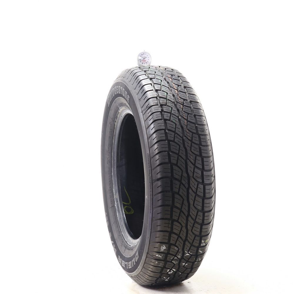 Used 215/70R16 Bridgestone Dueler H/T 687 99S - 9.5/32 - Image 1