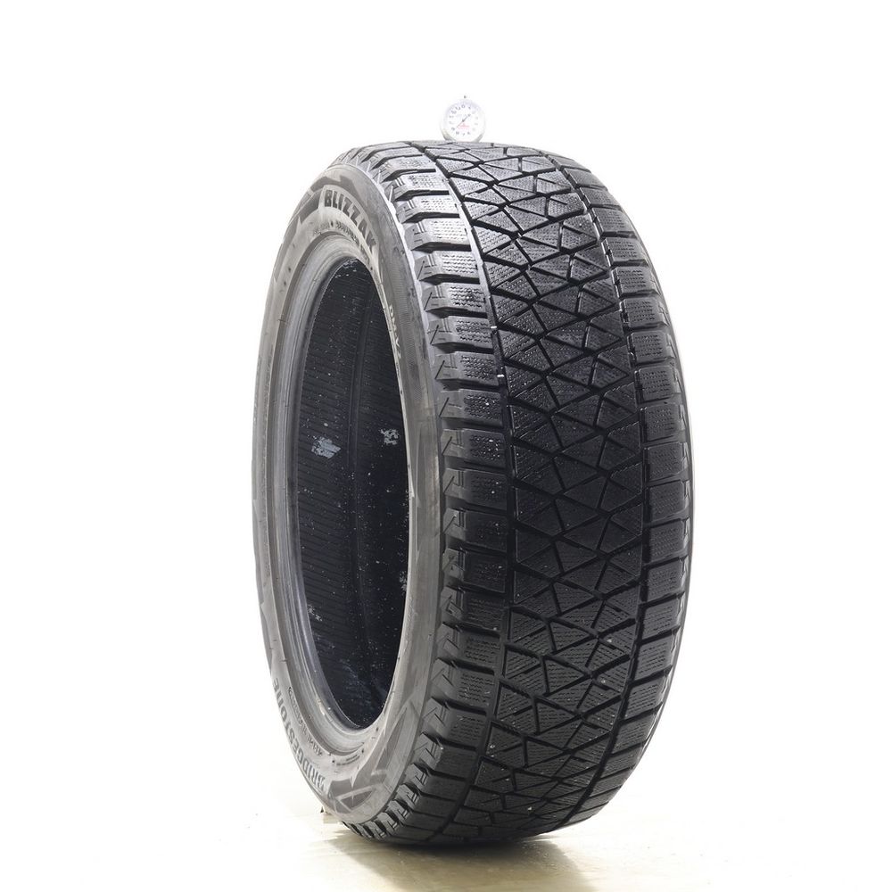 Used 265/50R20 Bridgestone Blizzak DM-V2 107T - 8.5/32 - Image 1