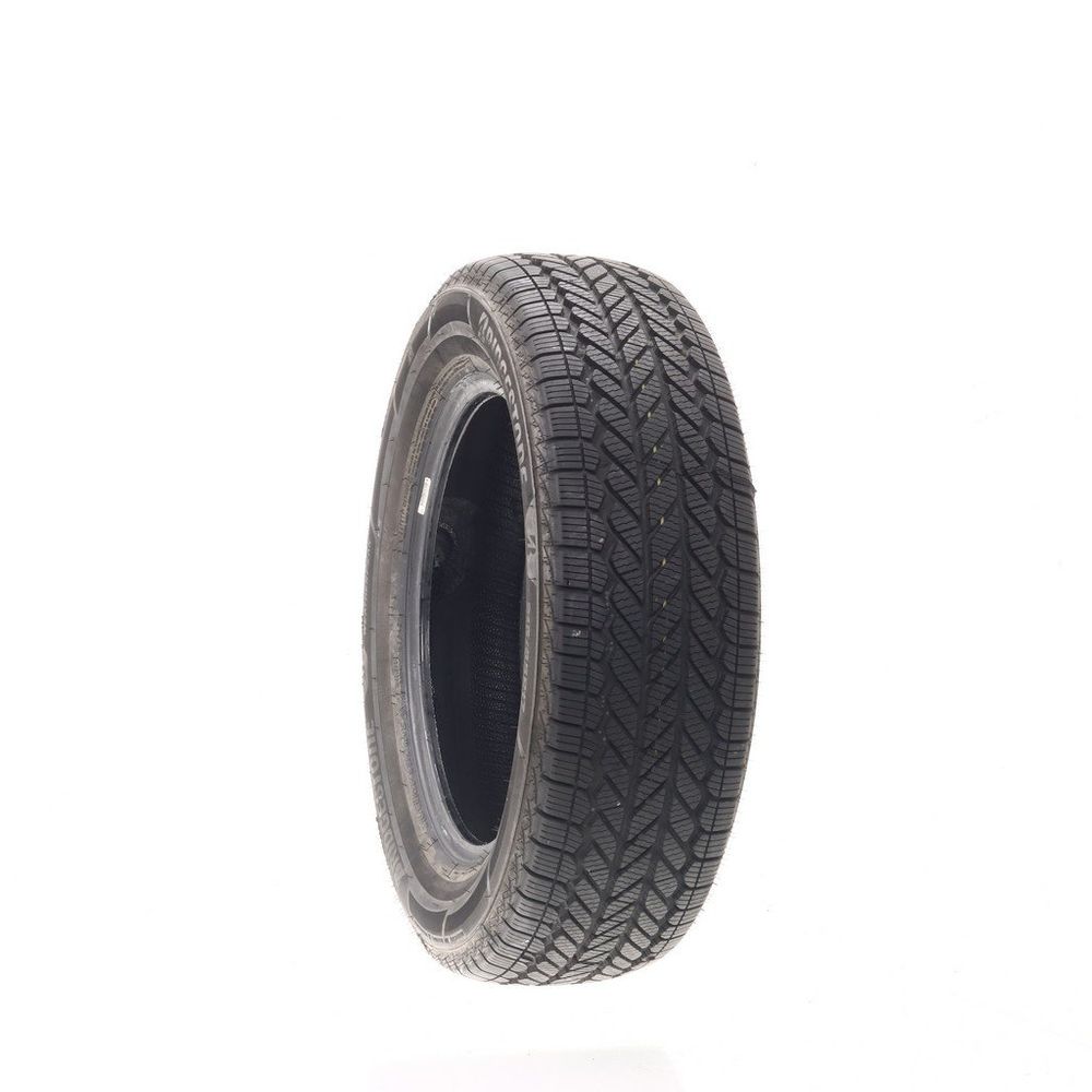 Set of (2) Driven Once 215/65R17 Bridgestone WeatherPeak 99H - 10/32 - Image 1