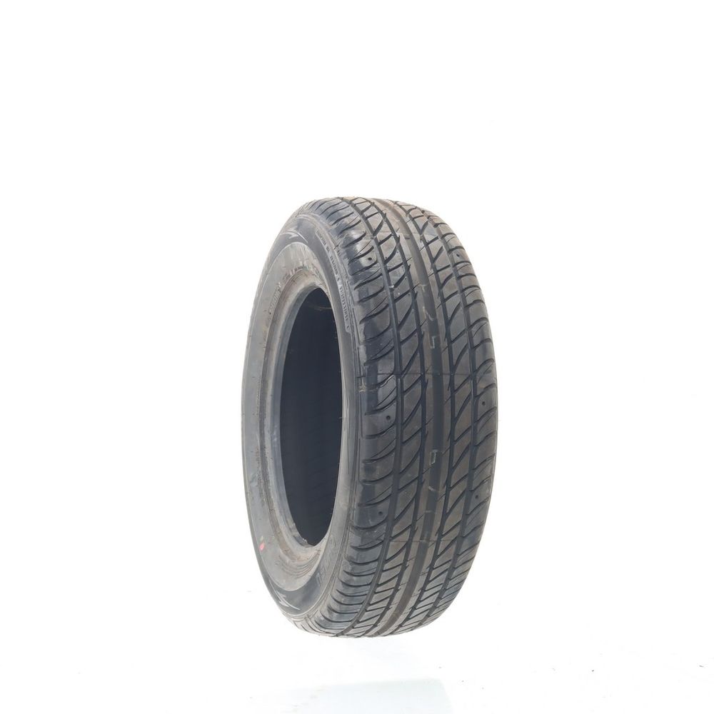 Set of (2) Driven Once 215/65R16 Ohtsu FP7000 98H - 9.5/32 - Image 1