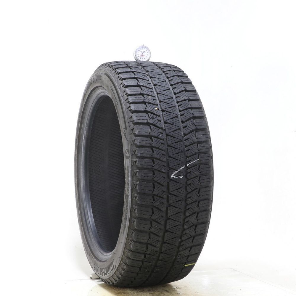 Set of (2) Used 235/45R18 Bridgestone Blizzak WS90 Studless 94H - 8.5/32 - Image 1