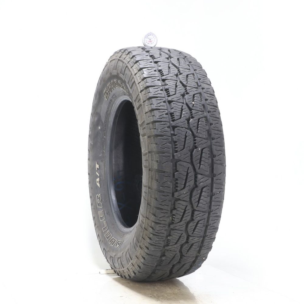 Used LT 265/70R17 Bridgestone Dueler A/T REVO 3 121/118S E - 11.5/32 - Image 1