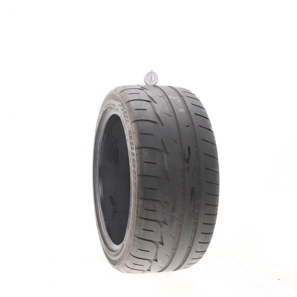 Used 275/40R18 Bridgestone Potenza RE-11 99W - 7/32 - Image 1