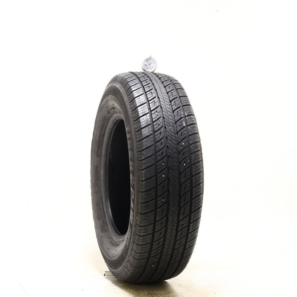 Used 215/70R15 Uniroyal Tiger Paw Touring A/S 98H - 9.5/32 - Image 1