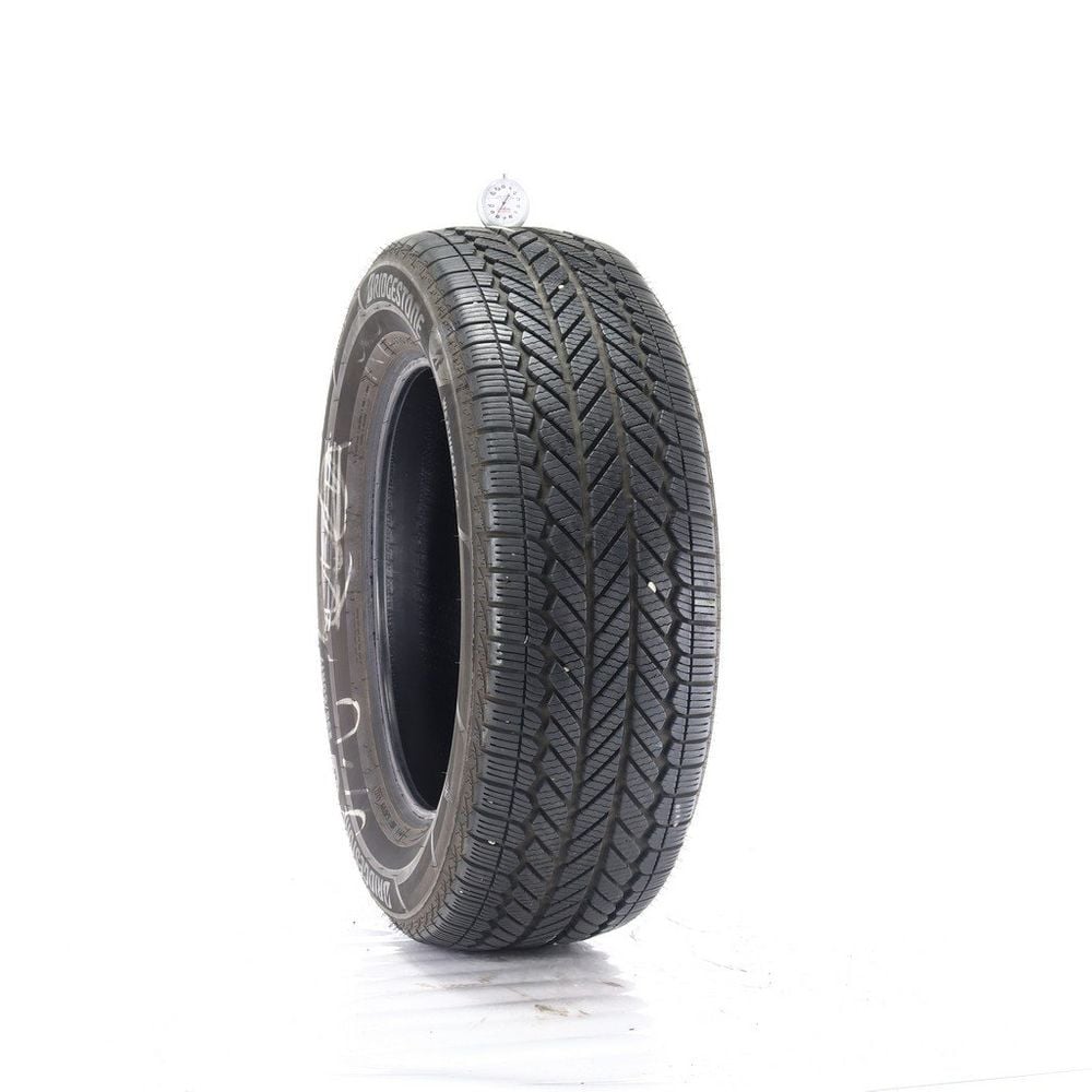 Set of (4) Used 235/60R17 Bridgestone WeatherPeak 102H - 8-8.5/32 - Image 1