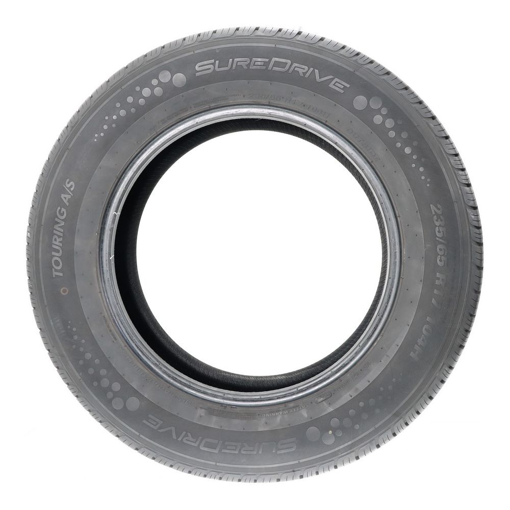 Set of (4) Used 235/65R17 SureDrive Touring A/S TA71 104H - 9.5-11/32 ...