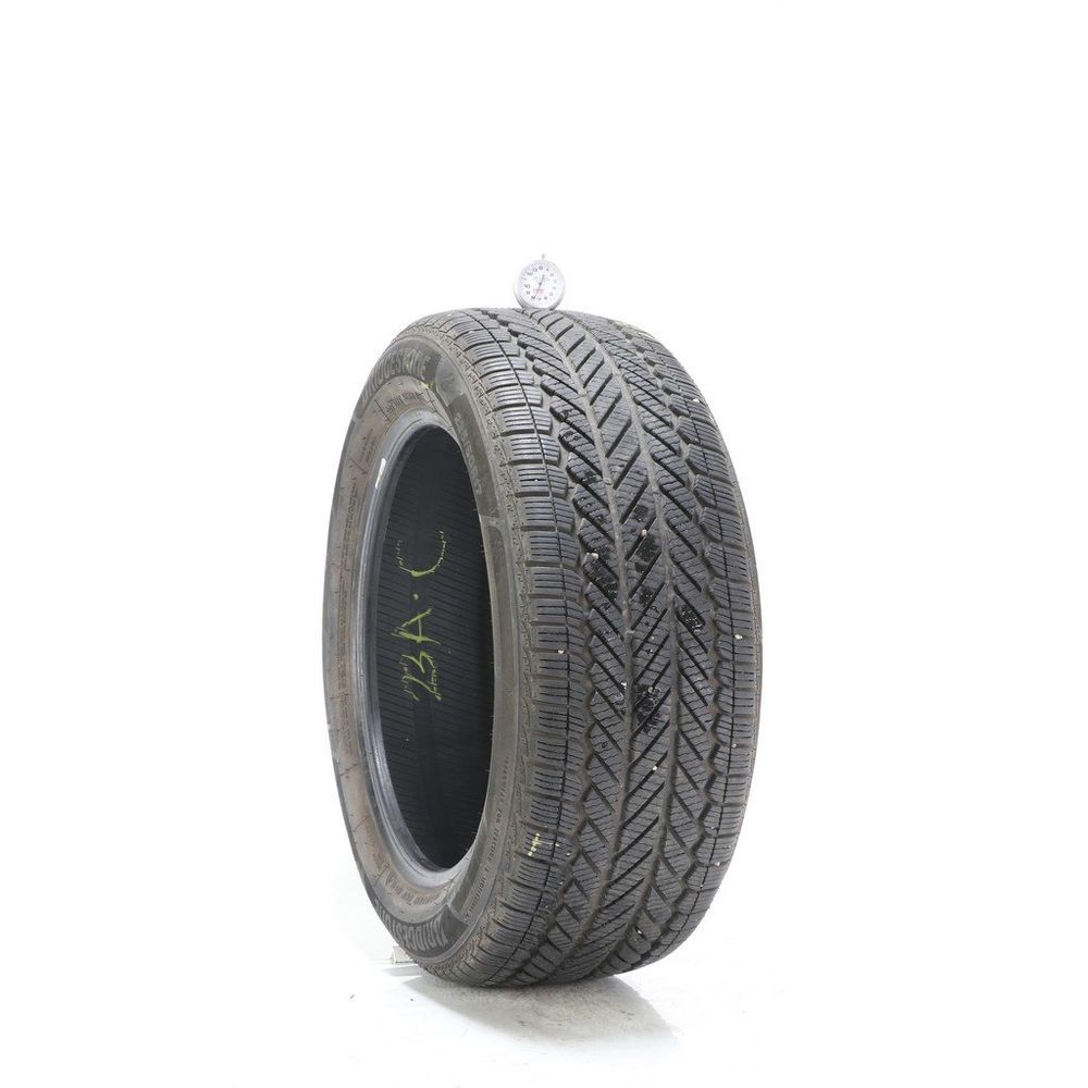 Set of (2) Used 235/50R17 Bridgestone WeatherPeak 96V - 7.5-8/32 - Image 1