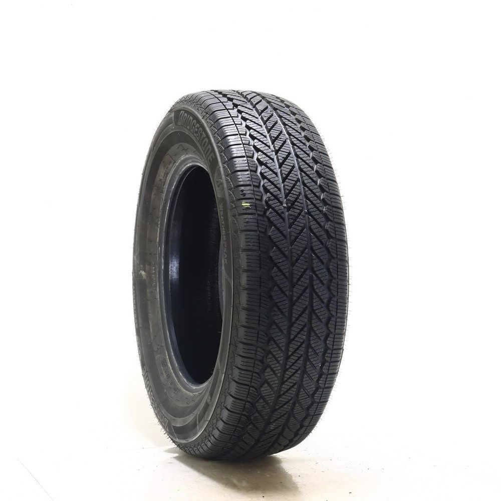 Set of (2) Driven Once 235/65R17 Bridgestone WeatherPeak 104H - 10/32 - Image 1