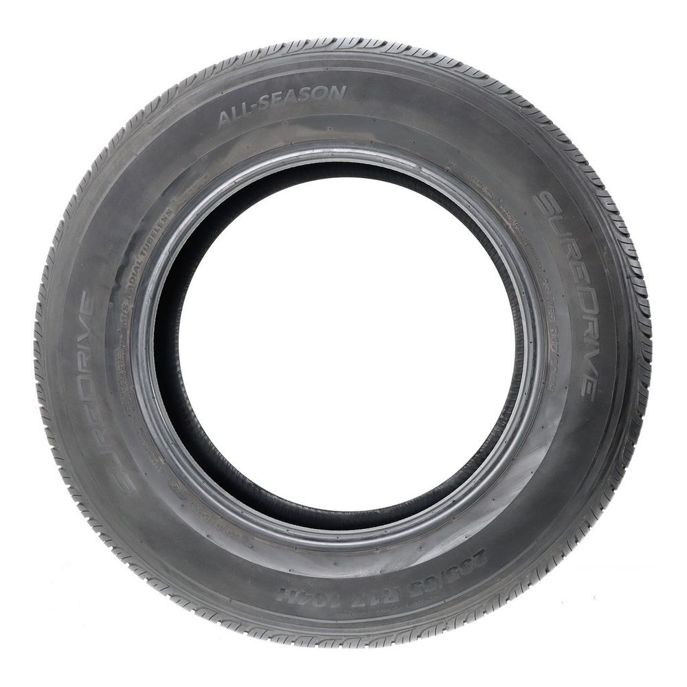 Set of (2) Used 235/65R17 SureDrive All-season 104H - 7.5-9/32 - Image 6