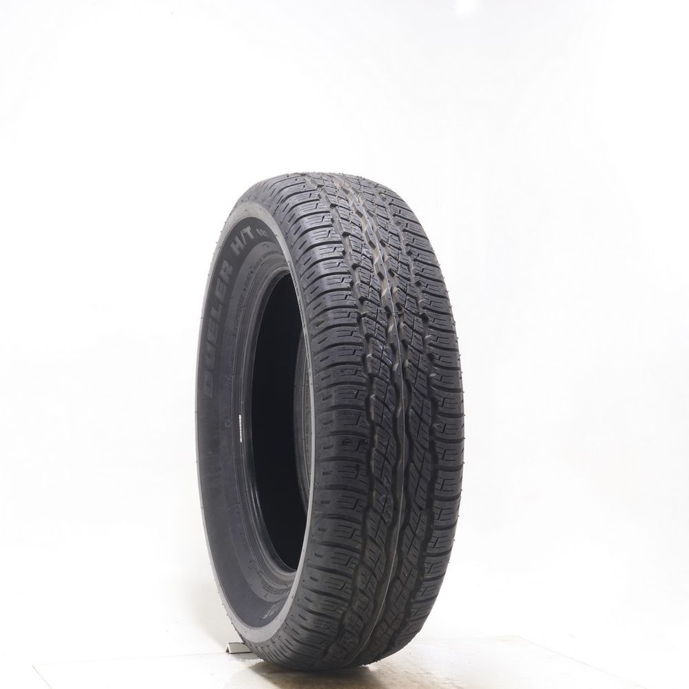 Set of (2) Driven Once 225/65R17 Bridgestone Dueler H/T 687 101H - 9/32 - Image 1