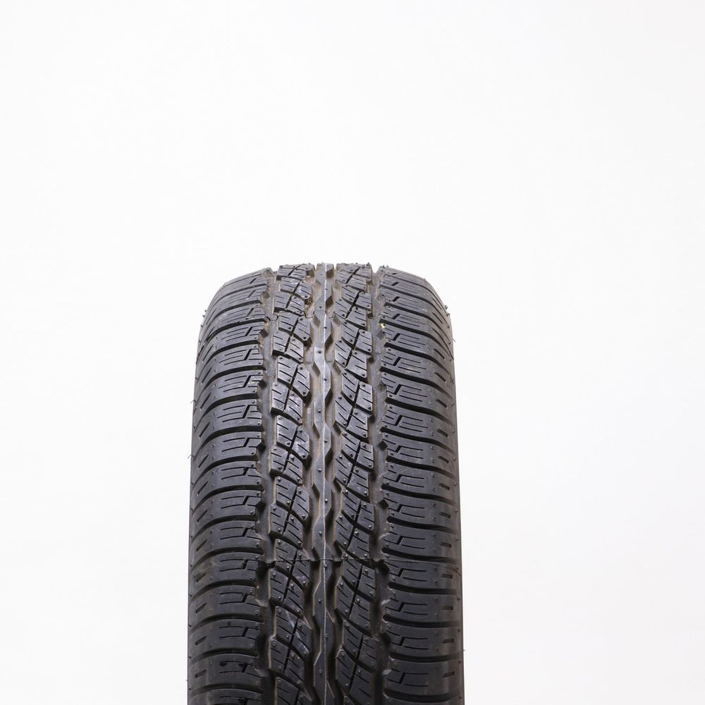 Set of (2) Driven Once 225/65R17 Bridgestone Dueler H/T 687 101H - 9/32 - Image 2