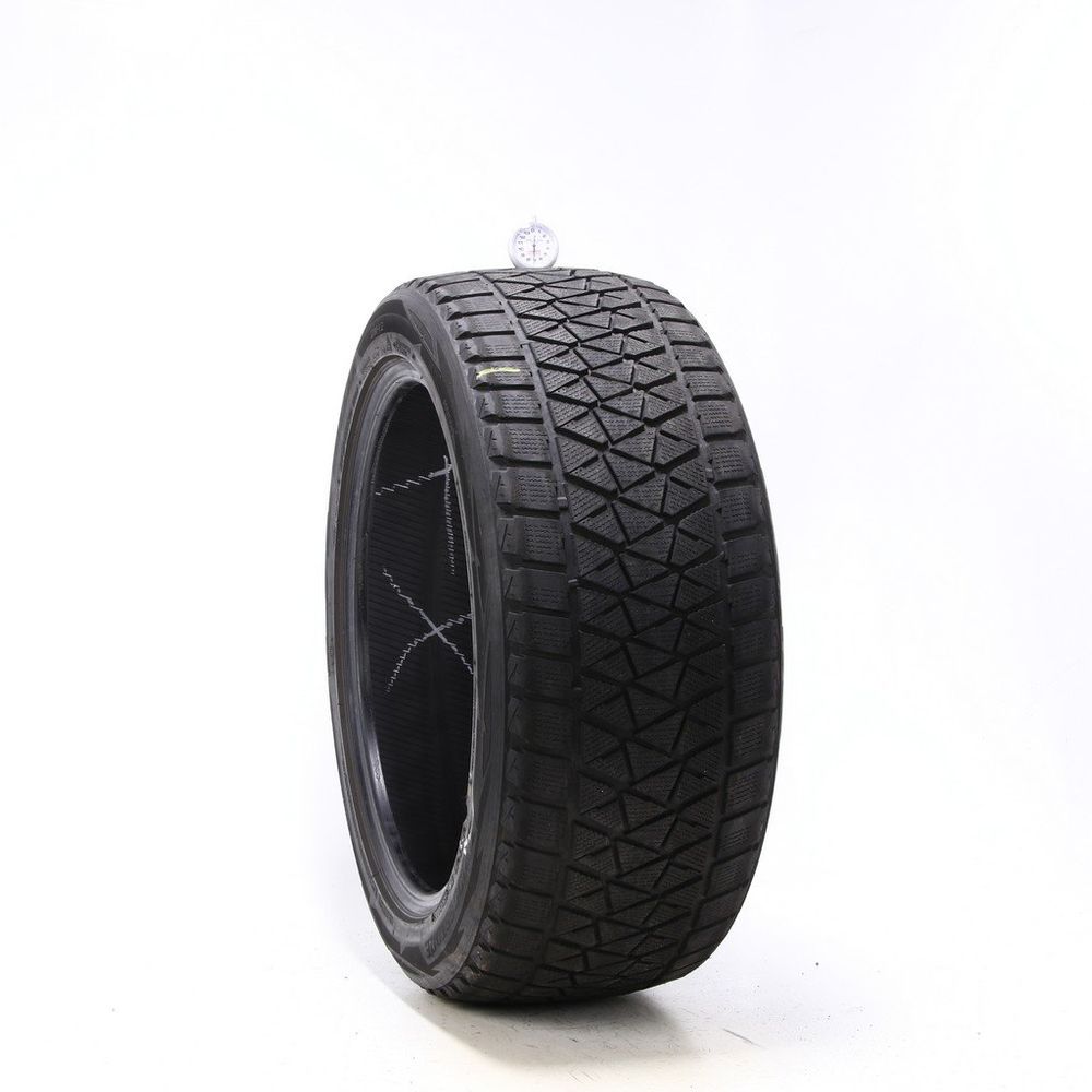 Set of (4) Used 275/45R20 Bridgestone Blizzak DM-V2 110T - 7-8/32 - Image 1