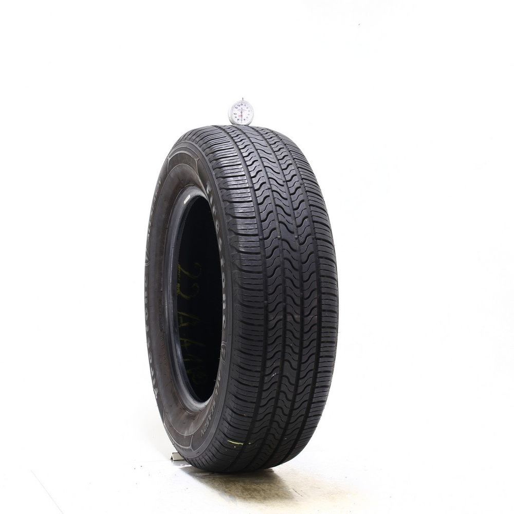 Set of (2) Used 215/65R16 Firestone All Season (Firestone) 98T - 7-8/32 - Image 1