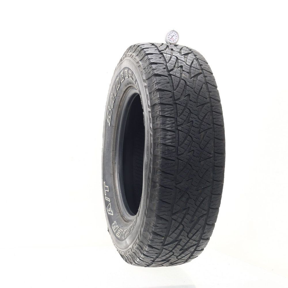 Used 265/70R17 Bridgestone Dueler A/T REVO 2 113T - 8.5/32 - Image 1