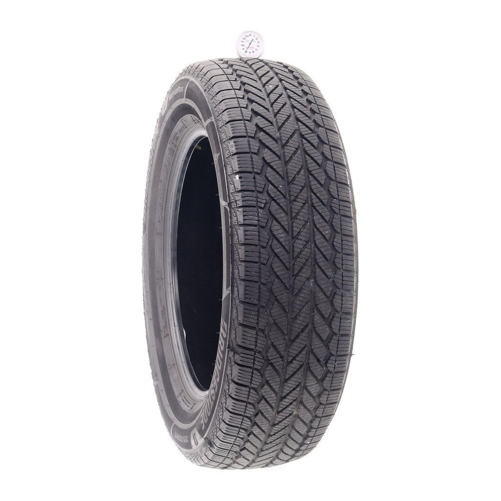 Set of (4) Used 215/65R17 Bridgestone WeatherPeak 99H - 8-9/32 - Image 1