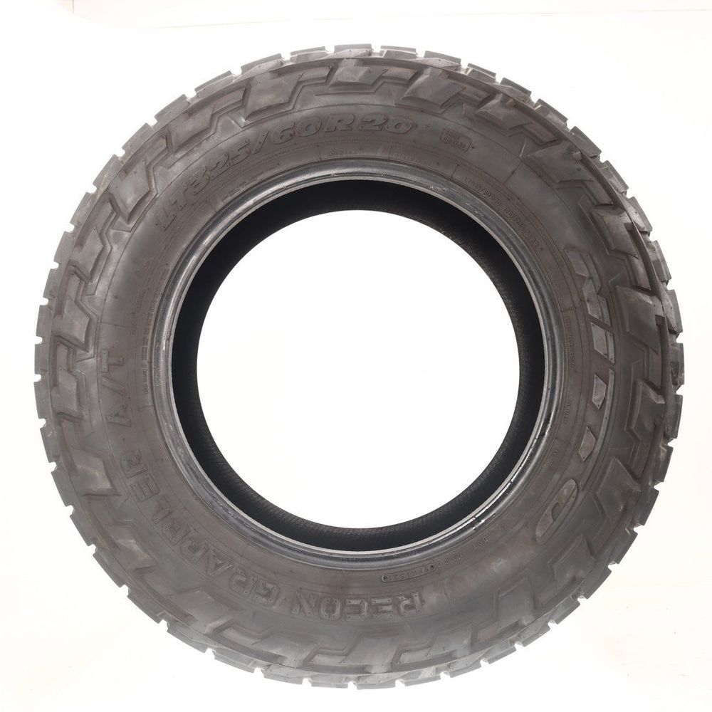 Used LT 325/60R20 Nitto Recon Grappler A/T 126/123S E - 13/32 - Image 3