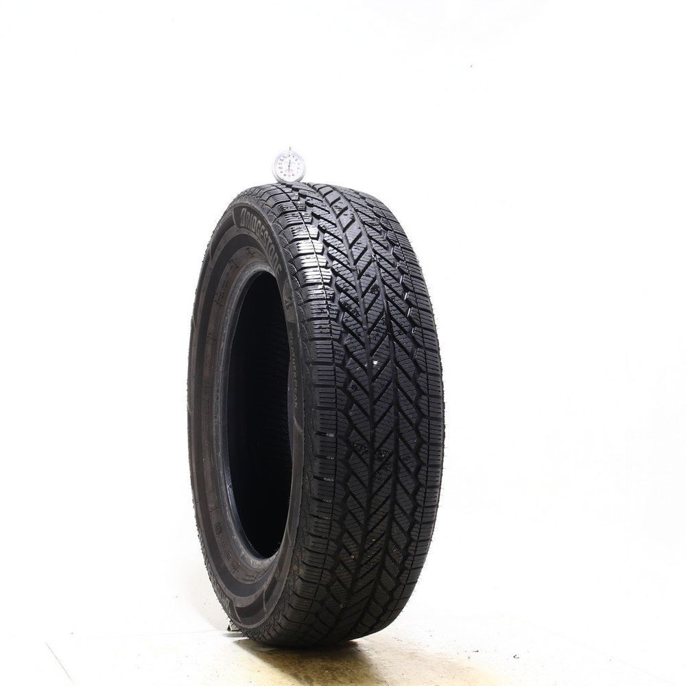 Set of (2) Used 215/65R17 Bridgestone WeatherPeak 99H - 7-8.5/32 - Image 1