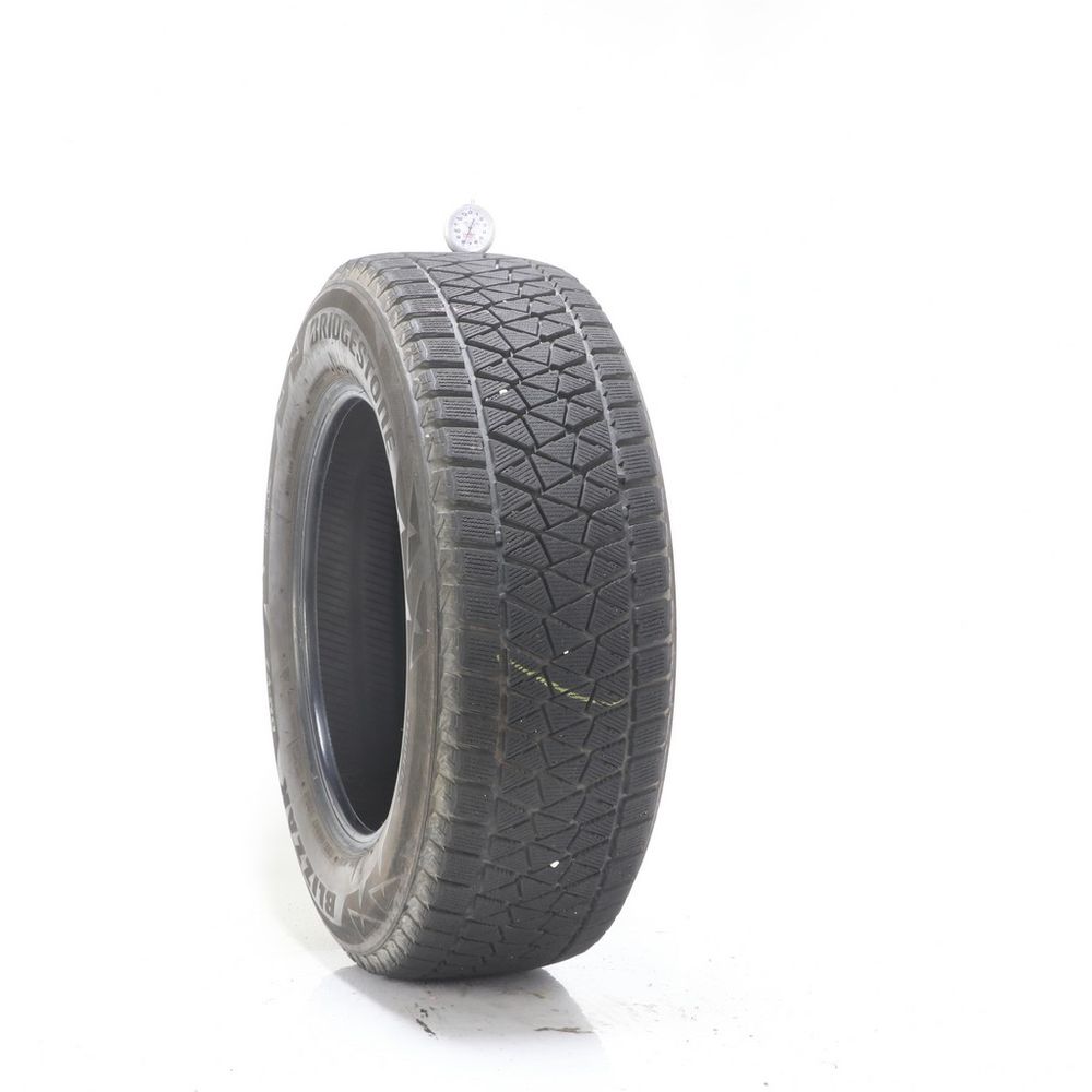 Set of (2) Used 235/65R17 Bridgestone Blizzak DM-V2 108S - 7.5/32 - Image 1