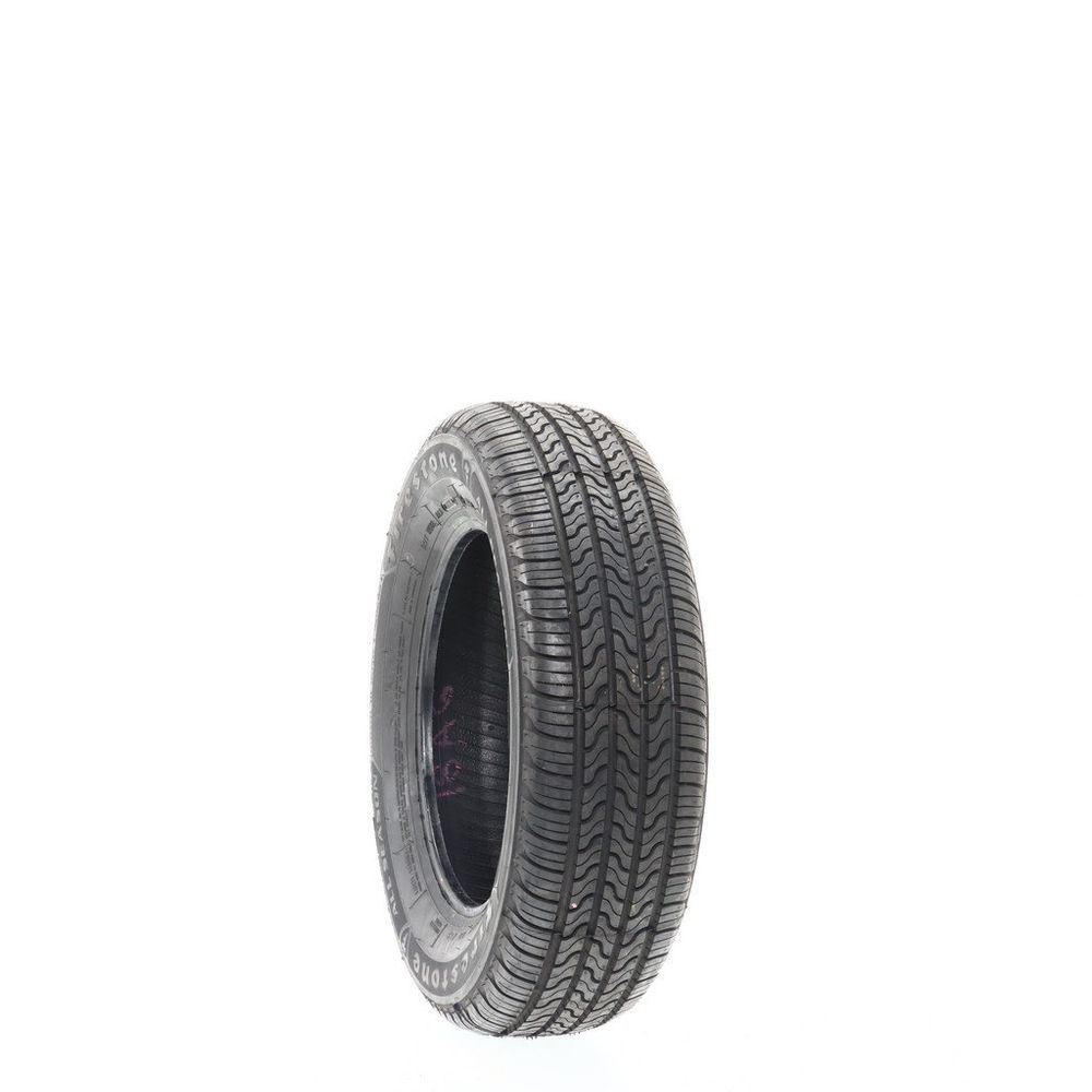 Set of (2) Driven Once 185/65R14 Firestone All Season (Firestone) 86T - 9.5-10/32 - Image 1