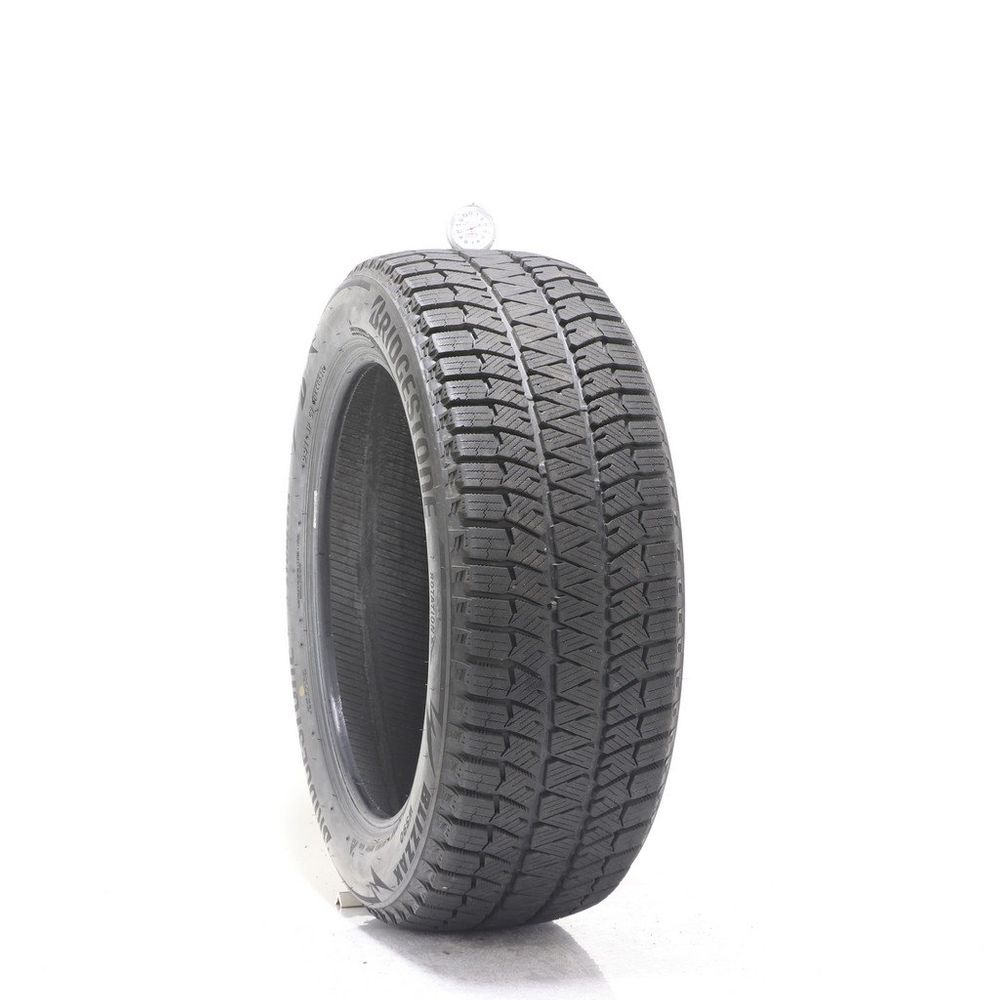 Set of (2) Used 215/55R18 Bridgestone Blizzak WS90 Studless 95T - 9.5-10/32 - Image 1