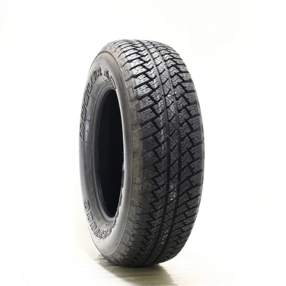 Set of (2) Used 255/70R18 Bridgestone Dueler A/T RH-S 112S - 14.5-15/32 - Image 1